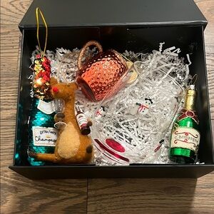 Assortment of Christmas ornaments and wine glass EUC